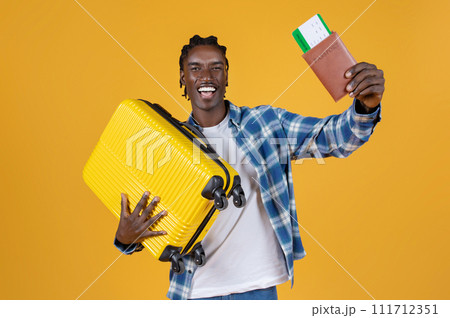 Travelling Concept. Portrait Of Happy Black Young Man With Suitcase And Passport 111712351