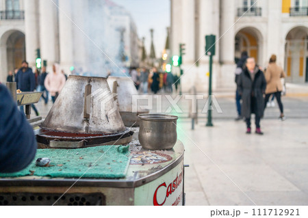 Roasted chestnuts sold on streets of historic Roasted chestnuts sold on streets of historic 111712921
