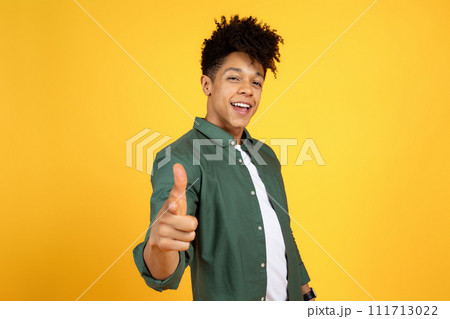 Funny stylish african american man pointing finger at camera Funny stylish african american man pointing finger at camera 111713022
