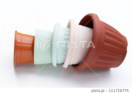 Plastic plant pots, containers on white background. Plastic plant pots, containers on white background. 111716774