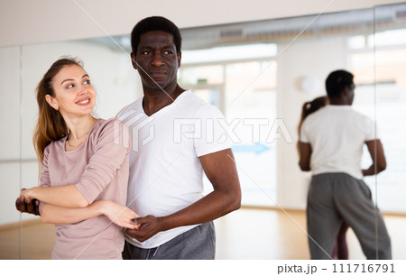 Adult people dancing slow ballroom dances in pairs 111716791