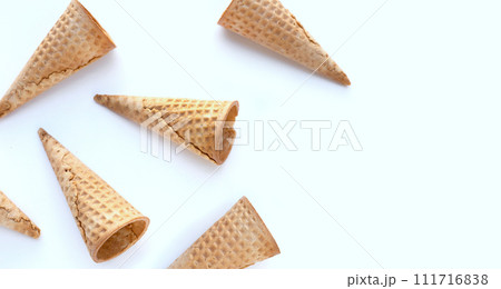 Empty ice cream cones on white background. 111716838