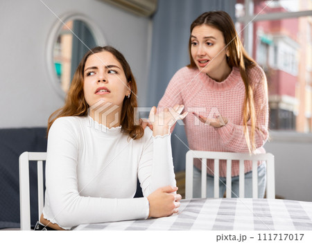 Young female couple having problems in relationship Young female couple having problems in relationship 111717017