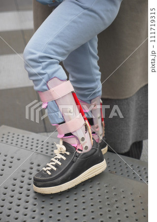 Child cerebral palsy disability, legs orthosis. 111719315