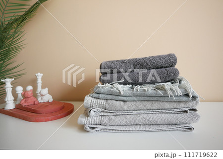 Stack of clothes on table indoor. Stack of clothes on table indoor. 111719622