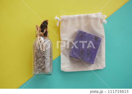 Homemade natural soap bar and lavender flower on table  111719815