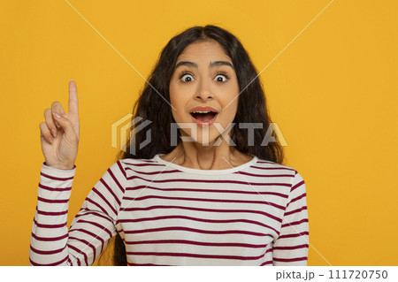 Inspired young indian woman showing eureka gesture 111720750