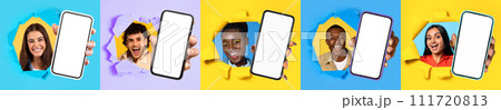 Five diverse people happily peering through torn paper with smartphones 111720813