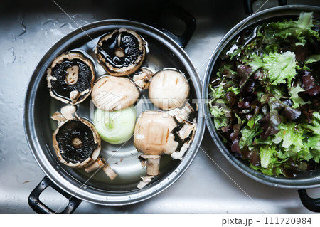shiitake mushroom and lettuce or cleaning vegetble for cook 111720984
