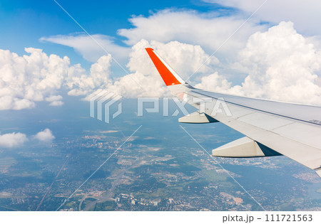 View from the airplane window during taking off on a clear summer morning 111721563