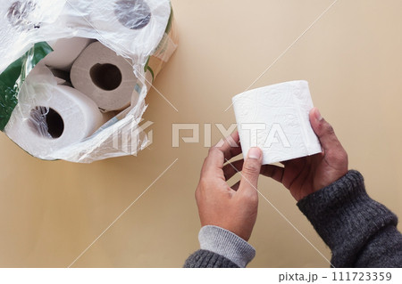 top view of holding a roll of toilet paper 111723359