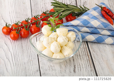 Mozzarella cheese balls in the bowl Mozzarella cheese balls in the bowl 111725820