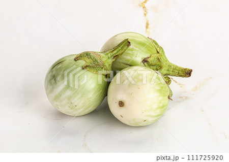Raw green round eggplant vegetable 111725920