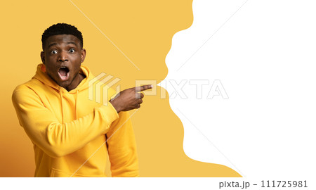 Amazed african american guy pointing at blank space, collage 111725981