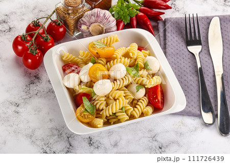 Italian pasta with mozzarella and tomato 111726439