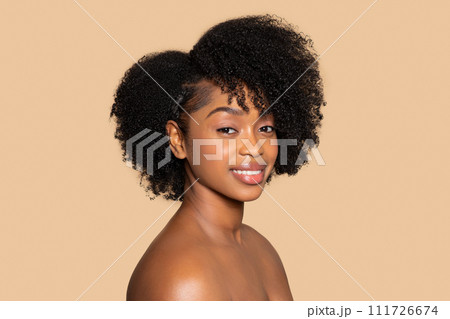 Radiant beauty with natural curly hair Radiant beauty with natural curly hair 111726674