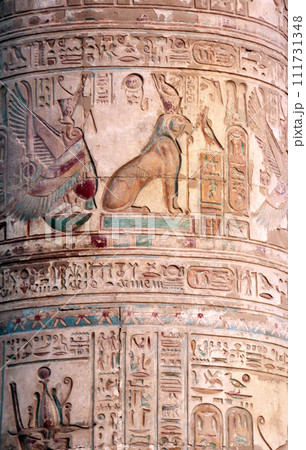 Ancient Column With Colorful Mural Wall Painting, Kom Ombo Temple of gods Horus and Sobek, Egypt. Great columns in Com-Ombo Temple Complex, Egypt, North Africa Ancient Column With Colorful Mural Wall Painting, Kom Ombo Temple of gods Horus and Sobek, Egypt. Great columns in Com-Ombo Temple Complex, Egypt, North Africa 111731348