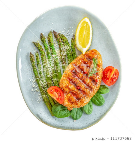 Chicken fillet cooked on a grill with asparagus isolated on white background 111737668