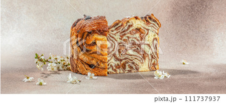 Festive Easter cake. marbled brioche with raisins and chocolate Festive Easter cake. marbled brioche with raisins and chocolate 111737937