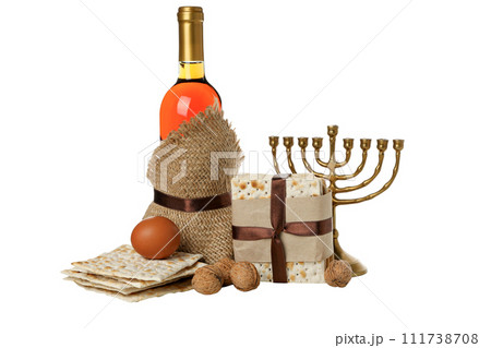 PNG, Bottle of wine, hanukkiah, matzo, nuts and egg, isolated on a white background 111738708