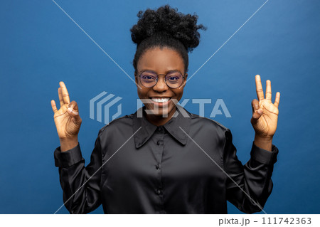 Happy african american woman smiling nicely 111742363