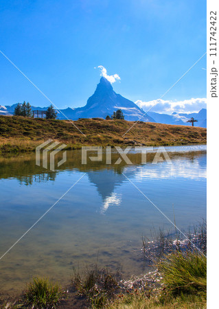 View of Leisee lake and Matterhorn mountain at summer on the Five Lakes Trail in Zermatt, Switzerland View of Leisee lake and Matterhorn mountain at summer on the Five Lakes Trail in Zermatt, Switzerland 111742422