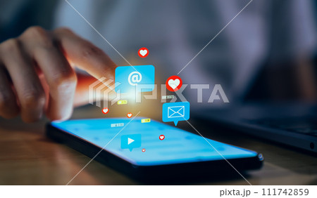 Hand using smartphone with social media and email on mobile. 111742859