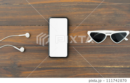 Top view of smartphone with blank screen on wood background, Template for placing your ad. Top view of smartphone with blank screen on wood background, Template for placing your ad. 111742870
