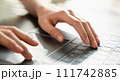 Hands typing keyboard on laptop with working online. 111742885