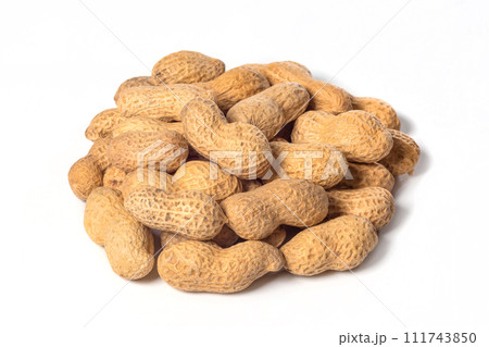 Heap of peanuts in shell, close-up on white background Heap of peanuts in shell, close-up on white background 111743850