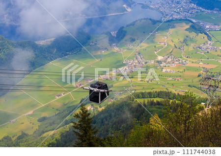 Gondola of Stanserhorn cabrio cable car to Stanserhorn mountain in Switzerland Gondola of Stanserhorn cabrio cable car to Stanserhorn mountain in Switzerland 111744038
