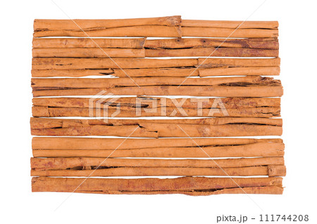Cinnamon sticks isolated on white background with full depth of field. Top view. Flat lay. Cinnamon sticks isolated on white background with full depth of field. Top view. Flat lay. 111744208