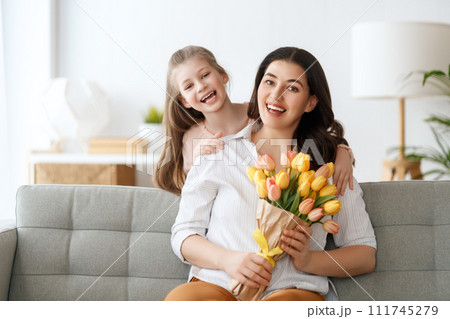 daughter and mom with flowers 111745279