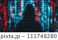 A mysterious figure in a hoodie stands before a backdrop of digital binary code, symbolizing cyber security and hacking. 111748280