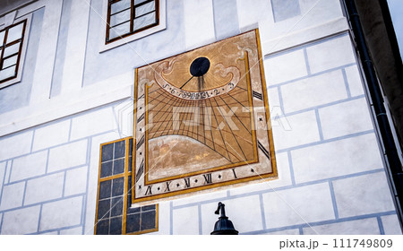 Anchient sun clock in Cesky Krumlov Anchient sun clock in Cesky Krumlov 111749809