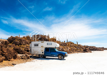 Car near rocky sunshine Cactus island Car near rocky sunshine Cactus island 111749846