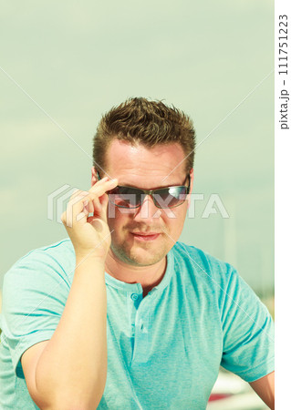 Portrait of handsome guy during summertime 111751223