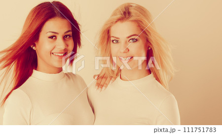 Two young friends together. Two young friends together. 111751783