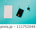 Phishing, data stealing concept. Envelope, credit card and key hanging on fishing hooks. 111752048
