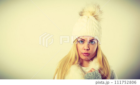 Woman wearing warm winter clothing 111752806