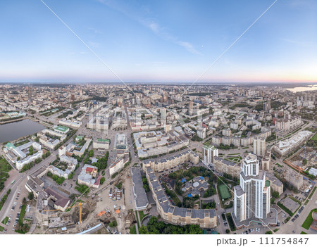 Yekaterinburg skyscraper aerial panoramic view at spring or autumn in clear sunset. Yekaterinburg is the fourth largest city in Russia located on the border of Europe and Asia. Yekaterinburg skyscraper aerial panoramic view at spring or autumn in clear sunset. Yekaterinburg is the fourth largest city in Russia located on the border of Europe and Asia. 111754847