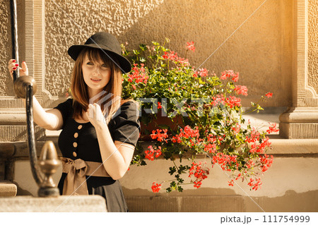 Retro style fashion woman in old town 111754999