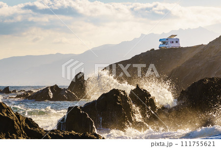 Seaside view with caravan camping on cliff Seaside view with caravan camping on cliff 111755621