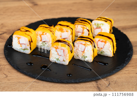 delicious traditional Japanese sushi and rolls on a plate 111756988