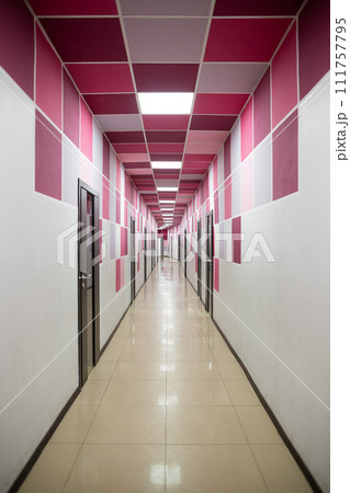 interior perspective of a long corridor with colored geometric lines interior perspective of a long corridor with colored geometric lines 111757795