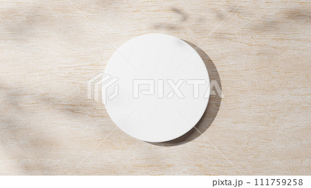 ベージュの木の板に白い円柱の台座。木の葉の影。3D（俯瞰）（横長） 111759258