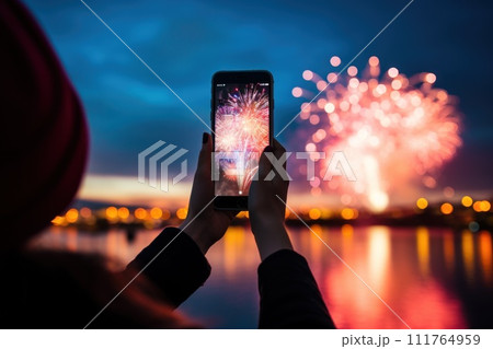 Woman take photo the fireworks display a night of celebration. Ai generated. 111764959