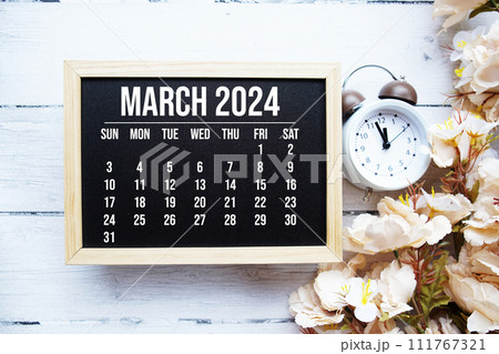 March 2024 monthly calendar with flower bouquet decoration on wooden background March 2024 monthly calendar with flower bouquet decoration on wooden background 111767321