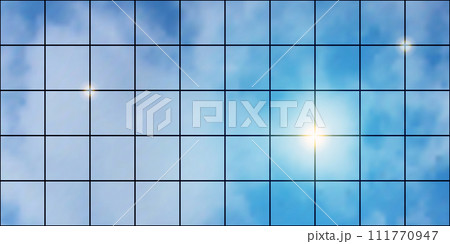 Mirror facade of a high-rise building with panoramic glazing and reflection of the cloudy sky and sun glare 111770947