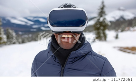 A young man wearing virtual reality glasses against a background of snow-capped mountains. Innovative travel 111772661